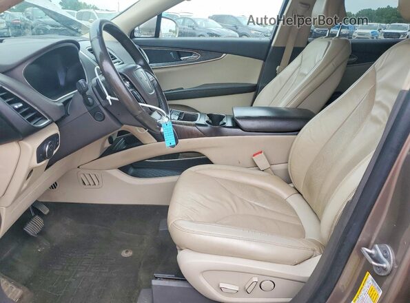 2LMPJ8K96KBL58548 2019 LINCOLN NAUTILUS Tan Vista interior delantera