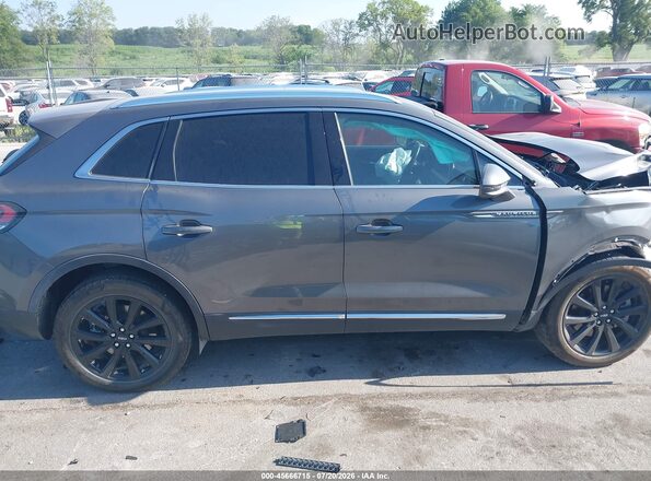 2LMPJ8K97NBL08777 2022 LINCOLN NAUTILUS Gray Սալոնի հետևի տեսք