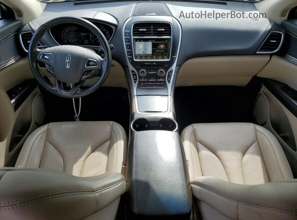 2LMPJ8KR6HBL52970 2017 LINCOLN MKX Tan Widok deski rozdzielczej