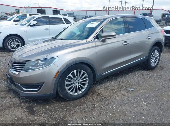 2LMPJ8KR7JBL38064 2018 LINCOLN MKX Gold Front left