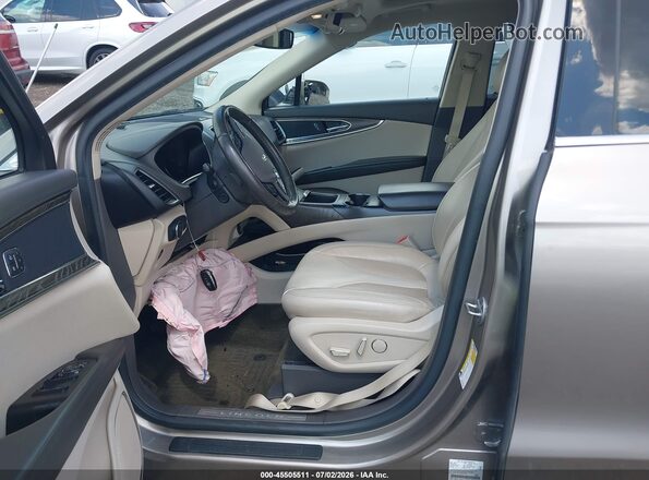2LMPJ8KR7JBL38064 2018 LINCOLN MKX Gold Front interior view