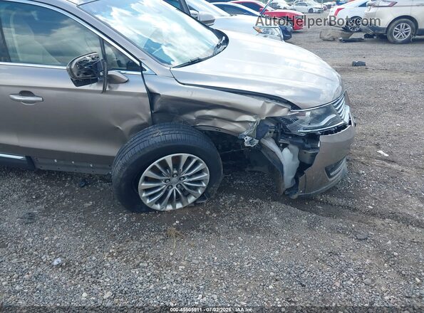 2LMPJ8KR7JBL38064 2018 LINCOLN MKX Gold Front view