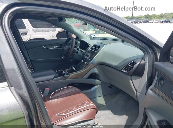 2LMPJ8L92KBL10284 2019 LINCOLN NAUTILUS Gray Widok wnętrza z przodu