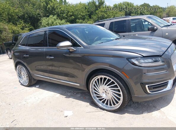 2LMPJ8L92KBL10284 2019 LINCOLN NAUTILUS Gray Widok wnętrza z tyłu