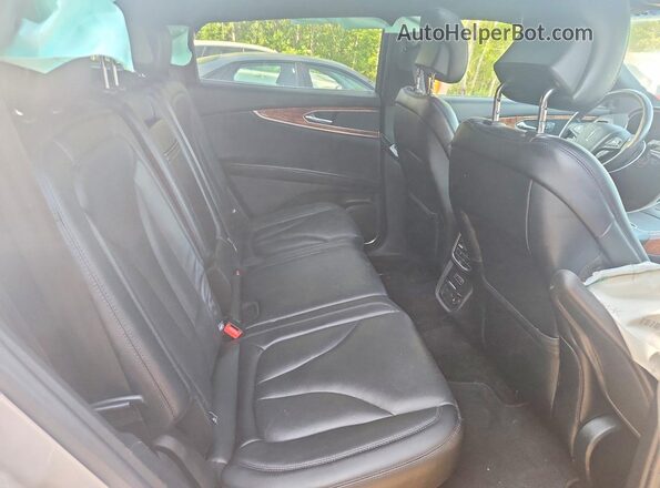 2LMPJ8LR3JBL49108 2018 LINCOLN MKX Серебряный Вид задней части салона