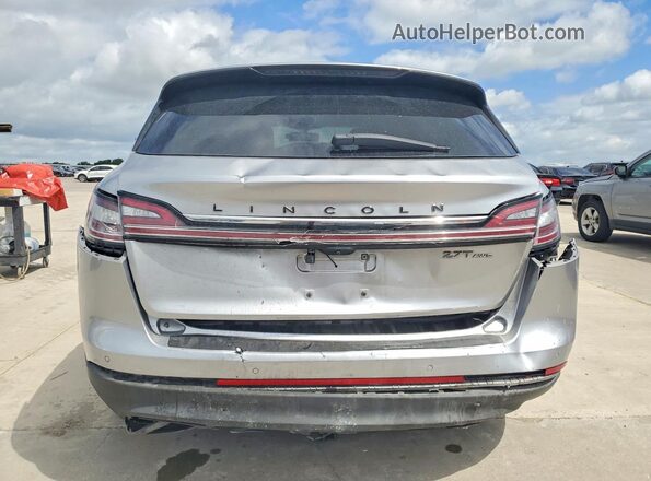 2LMPJ9JPXLBL24636 2020 LINCOLN NAUTILUS Silver Rear view