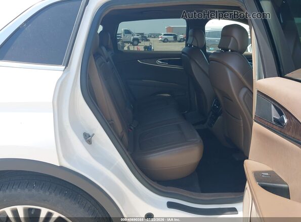 2LMTJ6LP4GBL33560 2016 LINCOLN MKX White VIN sticker view