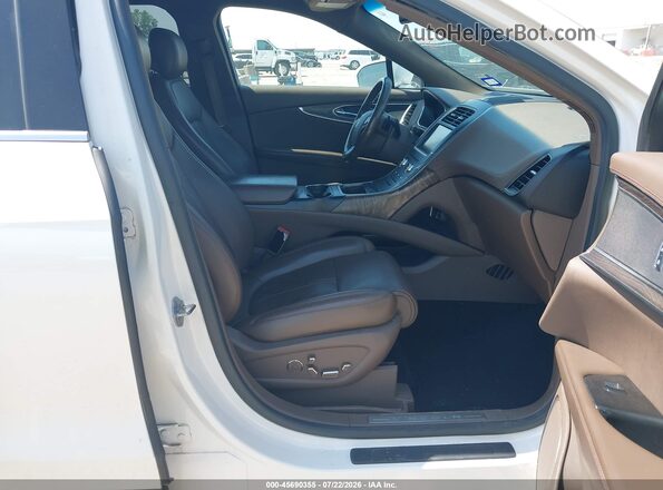 2LMTJ6LP4GBL33560 2016 LINCOLN MKX White Front interior view