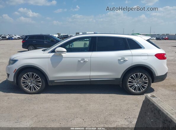 2LMTJ6LP4GBL33560 2016 LINCOLN MKX White Rear interior view