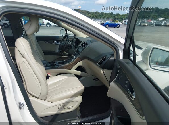 2LMTJ8LP0GBL30165 2016 LINCOLN MKX White წინა სალონის ხედი