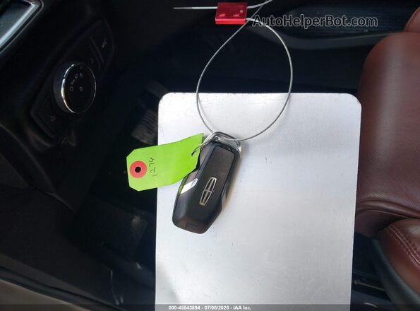 2LMTJ8LP1GBL78774 2016 LINCOLN MKX Gray Առջևի վահանակի տեսք