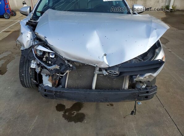 2T1BURHE0GC678765 2016 TOYOTA COROLLA Silver Rear interior view