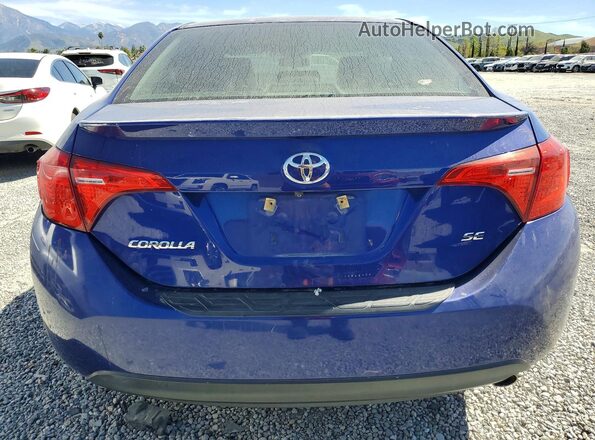 2T1BURHE0HC773974 2017 TOYOTA COROLLA Blue Вид ззаду
