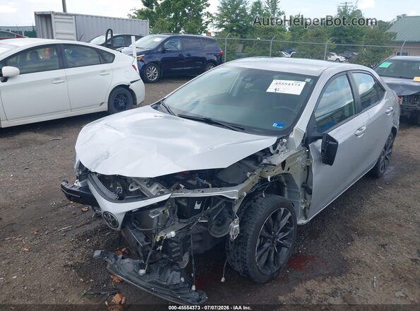 2T1BURHE0HC810568 2017 TOYOTA COROLLA Серебряный Вид спереди