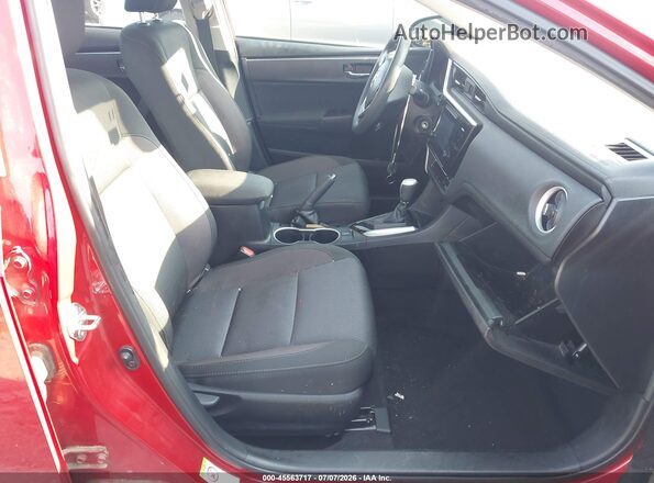2T1BURHE0HC832599 2017 TOYOTA COROLLA Red Front interior view