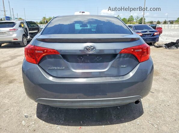 2T1BURHE0HC856921 2017 TOYOTA COROLLA Серый Вид сзади