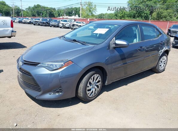 2T1BURHE0HC868373 2017 TOYOTA COROLLA Gray Vista tres cuartos delantera izquierda