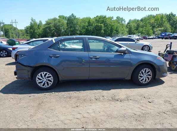 2T1BURHE0HC868373 2017 TOYOTA COROLLA Gray Vista interior trasera