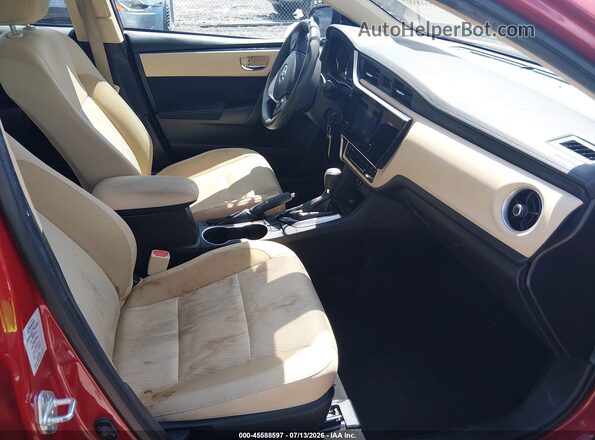 2T1BURHE0HC911030 2017 TOYOTA COROLLA Red Widok wnętrza z przodu
