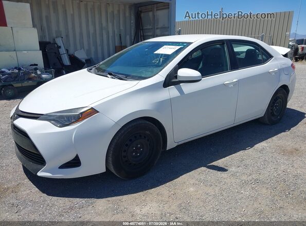 2T1BURHE0HC912968 2017 TOYOTA COROLLA White Vista tres cuartos delantera izquierda