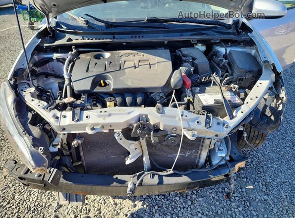 2T1BURHE0HC936042 2017 TOYOTA COROLLA Silver Vista interior trasera