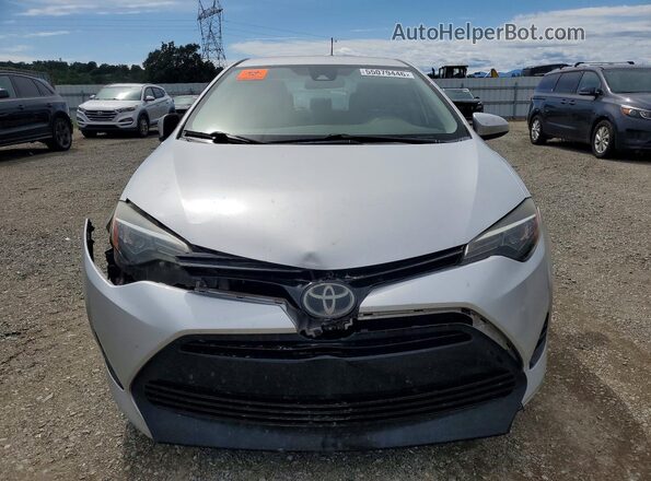 2T1BURHE0JC076200 2018 TOYOTA COROLLA Silver Front view