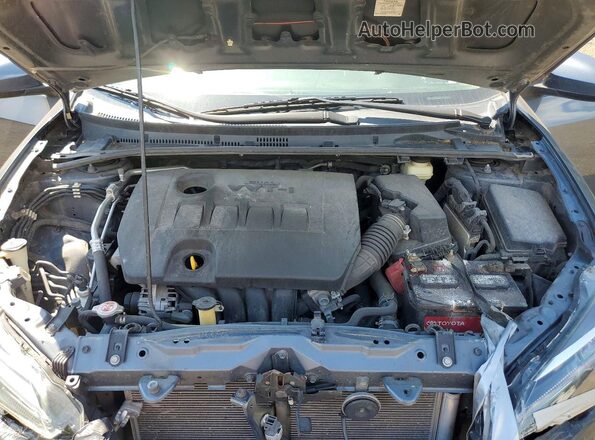2T1BURHE0JC963814 2018 TOYOTA COROLLA Gray Vista interior trasera