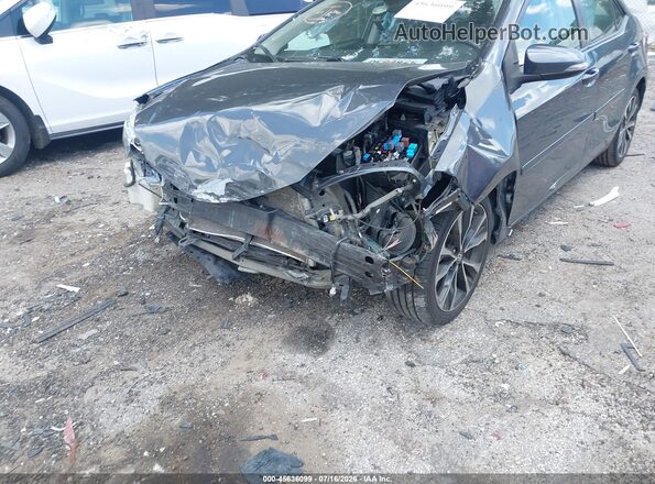 2T1BURHE0KC167436 2019 TOYOTA COROLLA Серый Вид спереди