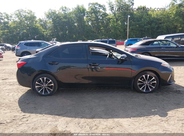 2T1BURHE0KC227506 2019 TOYOTA COROLLA Черный Вид задней части салона