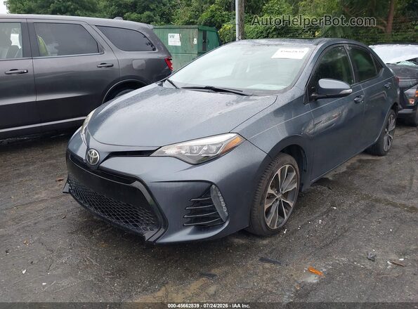 2T1BURHE1HC803872 2017 TOYOTA COROLLA Blue Vista tres cuartos delantera izquierda