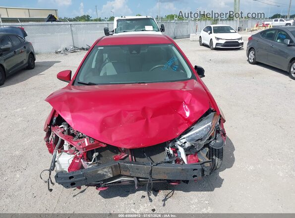 2T1BURHE1HC894268 2017 TOYOTA COROLLA Red Սալոնի հետևի տեսք