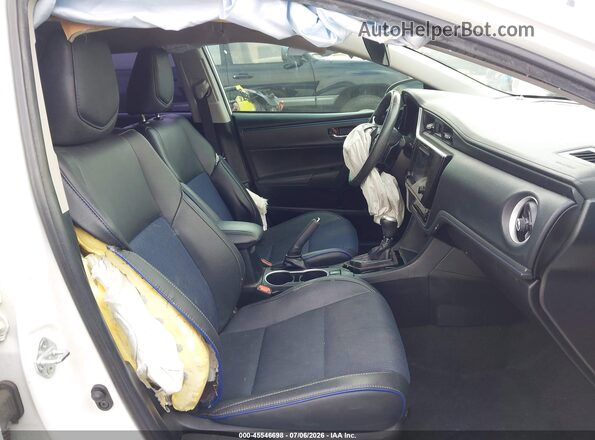 2T1BURHE1JC051743 2018 TOYOTA COROLLA White Vista interior delantera
