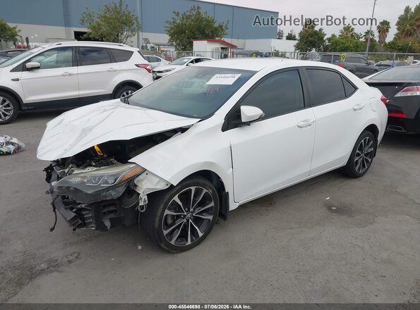 2T1BURHE1JC051743 2018 TOYOTA COROLLA White Vista tres cuartos delantera izquierda