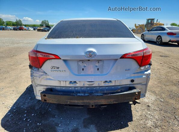 2T1BURHE1JC074343 2018 TOYOTA COROLLA Silver Rear view