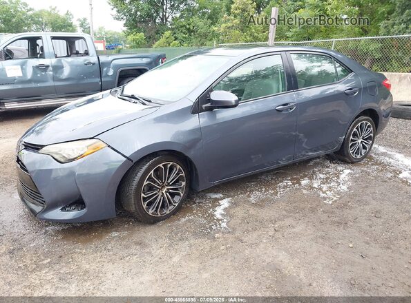 2T1BURHE1JC087335 2018 TOYOTA COROLLA Light Blue წინა მარცხენა ხედი სამი მეოთხედიდან