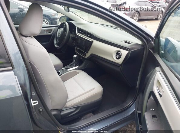 2T1BURHE1JC087335 2018 TOYOTA COROLLA Light Blue წინა სალონის ხედი