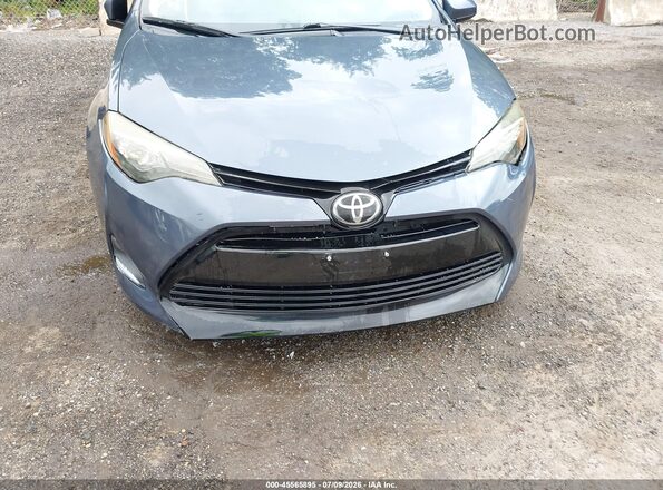 2T1BURHE1JC087335 2018 TOYOTA COROLLA Light Blue წინა ხედი