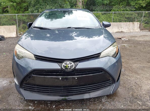 2T1BURHE1JC087335 2018 TOYOTA COROLLA Light Blue წინა პანელის ხედი