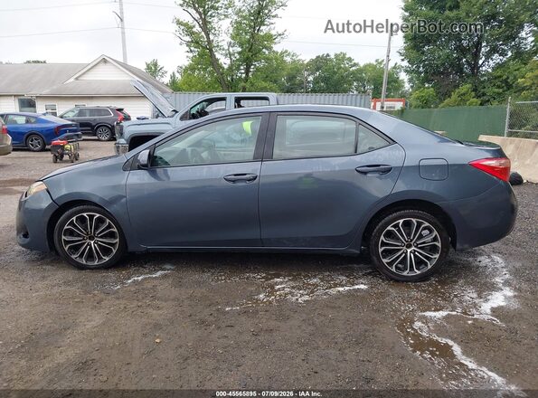 2T1BURHE1JC087335 2018 TOYOTA COROLLA Light Blue უკანა სალონის ხედი