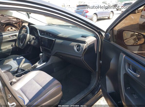 2T1BURHE1JC990729 2018 TOYOTA COROLLA Black Front interior view