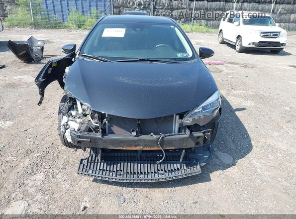 2T1BURHE1JC990729 2018 TOYOTA COROLLA Black Rear interior view