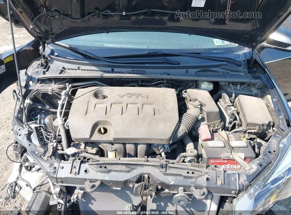 2T1BURHE1JC990729 2018 TOYOTA COROLLA Black Rear view
