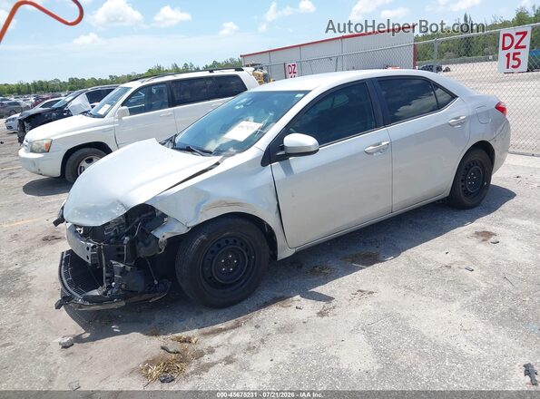 2T1BURHE1KC203635 2019 TOYOTA COROLLA Silver Vista tres cuartos delantera izquierda