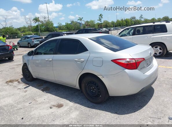 2T1BURHE1KC203635 2019 TOYOTA COROLLA Silver Trasero izquierdo