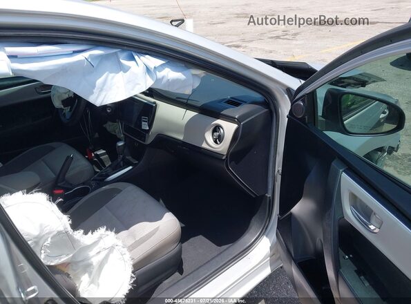2T1BURHE1KC203635 2019 TOYOTA COROLLA Silver Vista interior delantera