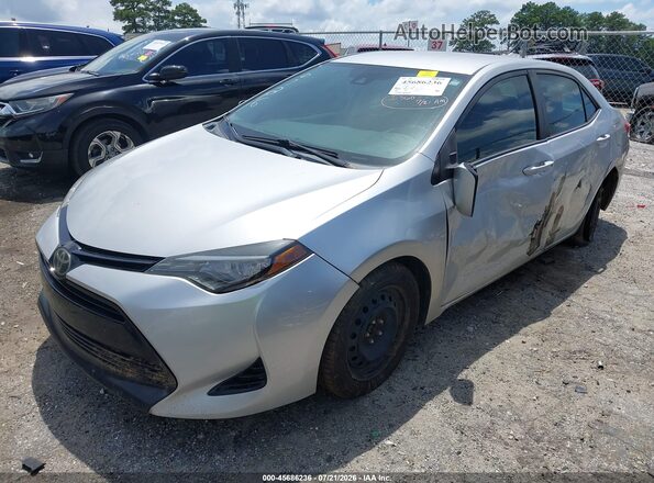 2T1BURHE2HC826786 2017 TOYOTA COROLLA Серебряный Передняя левая четверть