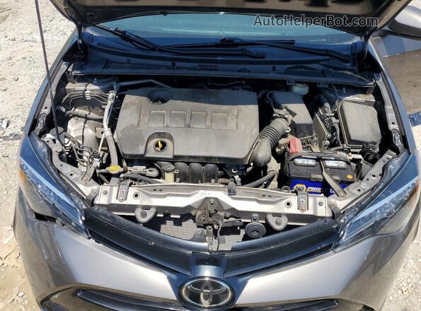 2T1BURHE2JC052321 2018 TOYOTA COROLLA Brown Widok wnętrza z tyłu