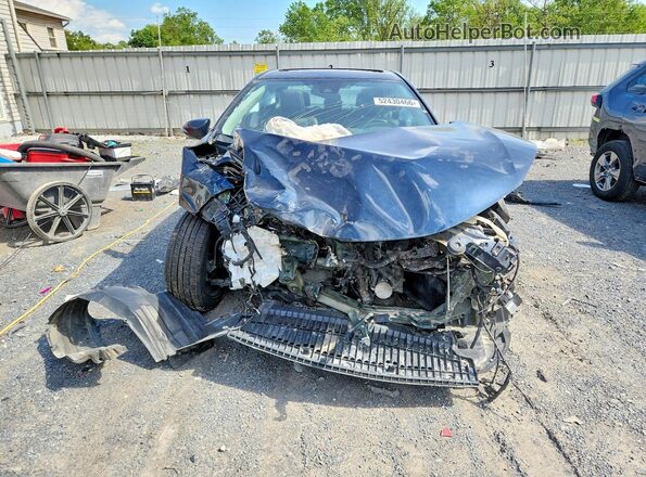 2T1BURHE2JC081706 2018 TOYOTA COROLLA Синий Вид спереди