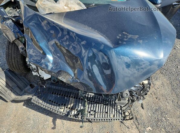 2T1BURHE2JC081706 2018 TOYOTA COROLLA Синий Вид задней части салона