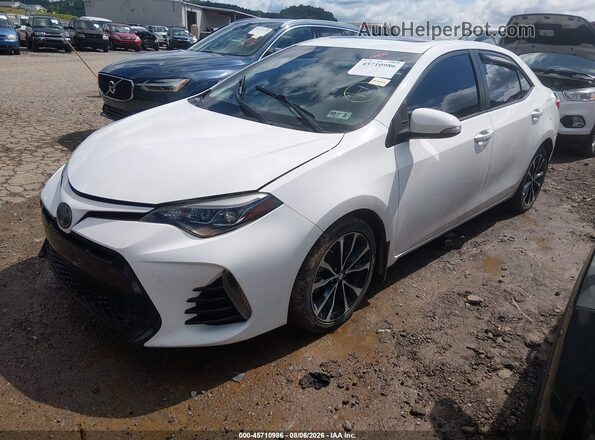 2T1BURHE2JC095380 2018 TOYOTA COROLLA White Front left